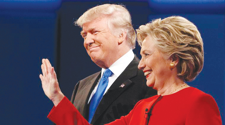 Republican presidential candidate Donald Trump, left, stands with Democratic presidential candidate Hillary Clinton at the first presidential debate at Hofstra University, Monday, Sept. 26, 2016, in Hempstead, N.Y. (AP Photo/ Evan Vucci)